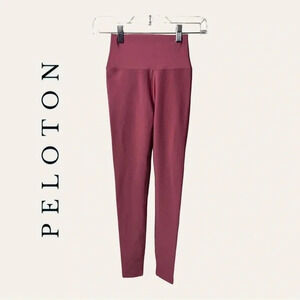 1169. Peloton SOLID FLEX LEGGINGS SIZE XSMALL PINK IN COLOR W/ WHITE PRINT‎ DOWN